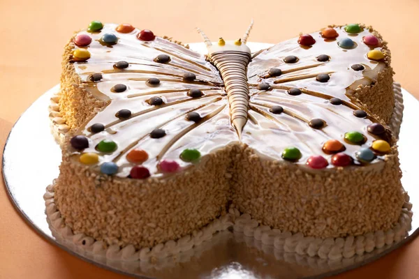 Ciasto Kształcie Motyla Kolorowymi Dodatkami Toffi — Zdjęcie stockowe