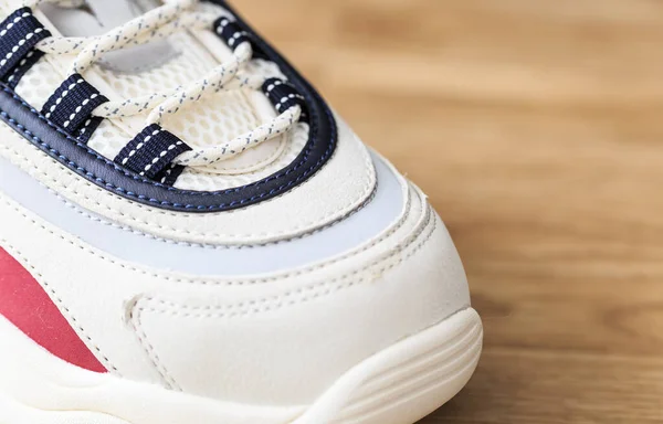 Closeup view of white shoelace sport sneakers — Stock Photo, Image