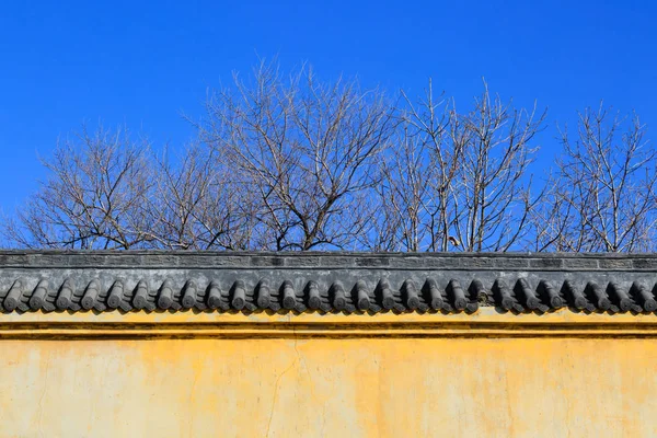 chinese traditional yellow color wall in winter view