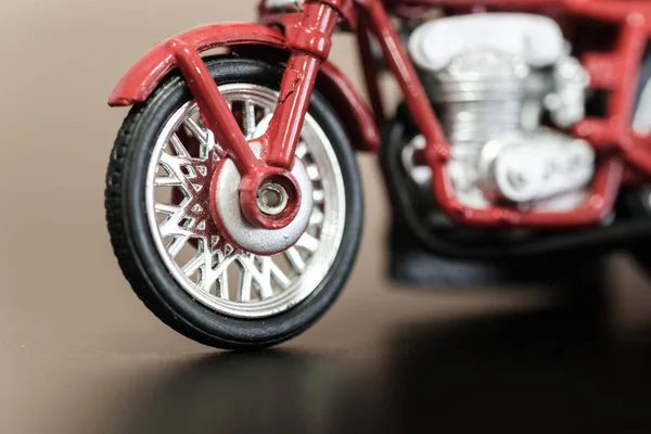 vintage red color motorbike toy closeup view