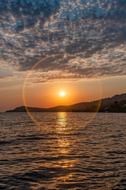 Denizde gün batımı daire efektiyle