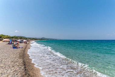 Halkidiki, Greece - September 05,2019: Porto Beach near Pefkochori, Halkidiki, Greece. One of the most beautiful beaches in the Halkidiki Peninsula.
