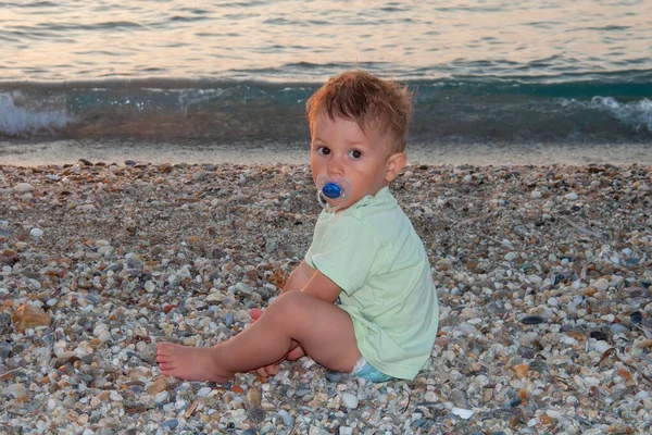Baby Boy Sitting Beach Pacifier Sunset — ストック写真