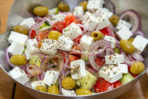 Greek salad in bowl close up