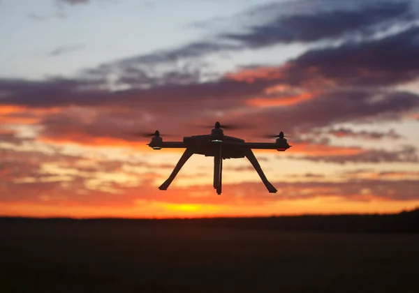 Drone in the sky during sunrise in vivid color