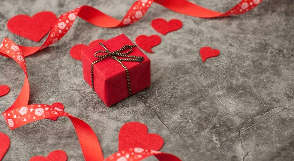 Holiday background for Valentine\'s Day on a gray cement backgrou