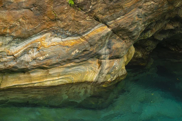 Taroko Pavilion Scenic Area, Hualien, Taiwan, with colorful rock walls and turquoise streams in Shakayu Creek