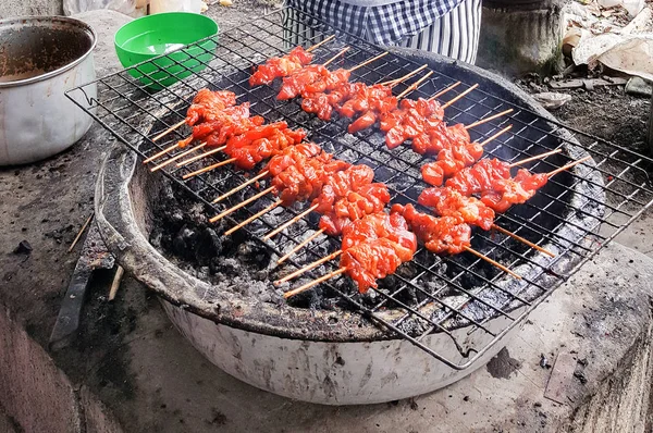 Thai grilled porks on grate — Stock Photo, Image