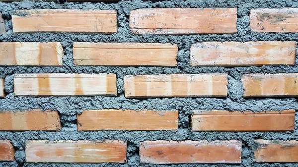 Close-up muro mattoni cemento sfondo — Foto Stock