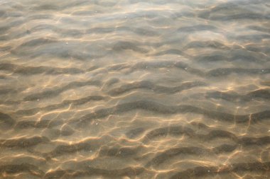 Deniz ve gün batımı manzaralı