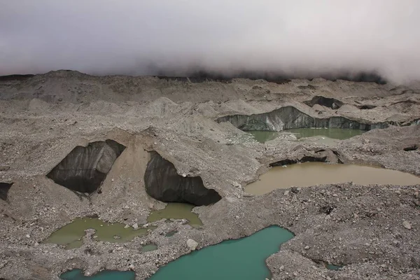 Big holes in the Ngozumpa glacier — Stock Photo, Image