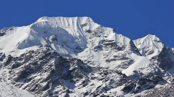 Mountain peak of Naya Kanga covered by thil glacier and snow. Vi — Stock Photo, Image