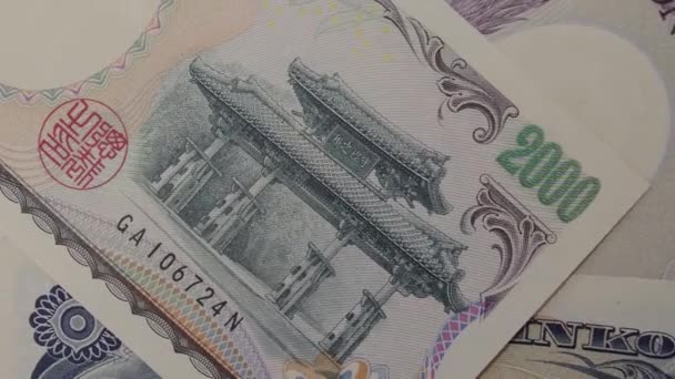 2000年日圆现钞 收盘价 钞票旋转着 — 图库视频影像