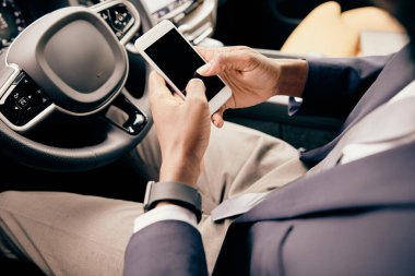 Man scrolling through the feed on his phone.