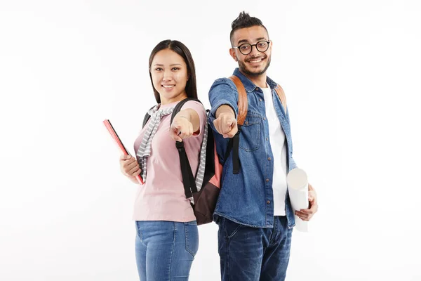 Due studenti posano insieme alla telecamera in varie pose . Immagine Stock