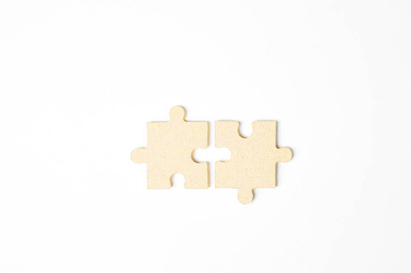 2 puzzles on a white background