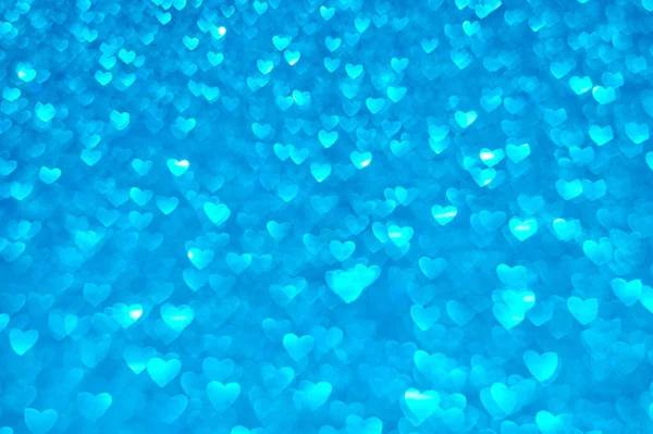 O conceito de dia dos namorados, corações azuis bokeh como fundo — Fotografia de Stock