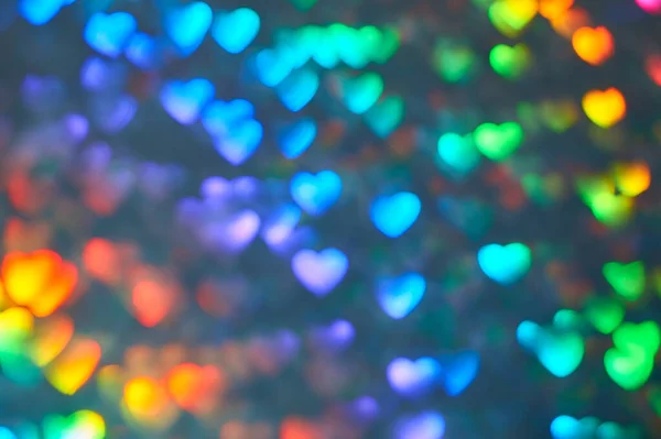 Espacio multicolor borrosa tridimensional en forma de corazón bokeh, colores brillantes jugosos neón, día de San Valentín, tarjeta de vacaciones, fondo abstracto — Foto de Stock