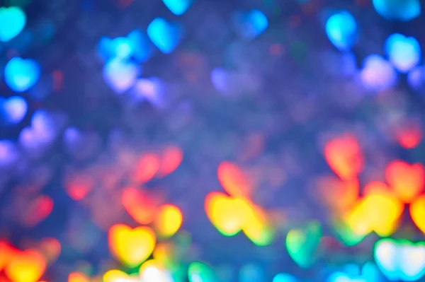 Çok renkli uzay bulanık üç boyutlu kalp şeklinde bokeh, neon sulu parlak renkler, sevgililer günü, tatil kartı, soyut arkaplan