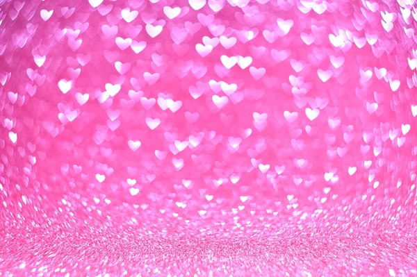 Abstract vintage background from glitter pink bokeh lights in the shape of a heart, blurred background — Stock Photo, Image