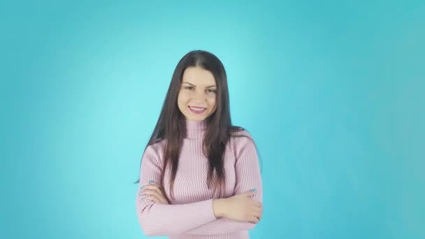 Young Cheerful Woman Showing Thumb up Over Blue Background. — Stok video