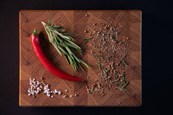 Close-up of thyme on a wooden Board with spices. Restaurant menu, a series of photos of various dishes