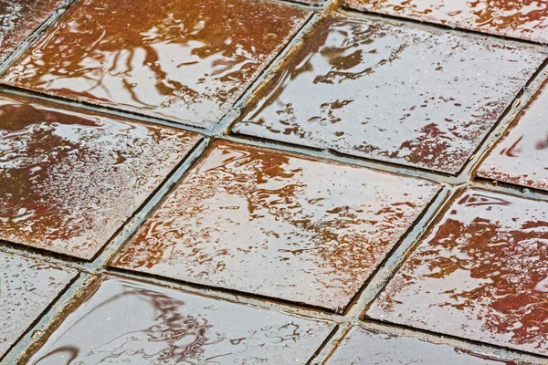 Texturas e coloridas marrom e dourado reflexões sobre telhas — Fotografia de Stock