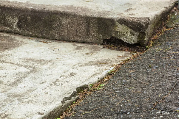 Close up Vintage Asphalt Driveway and Concrete Steps