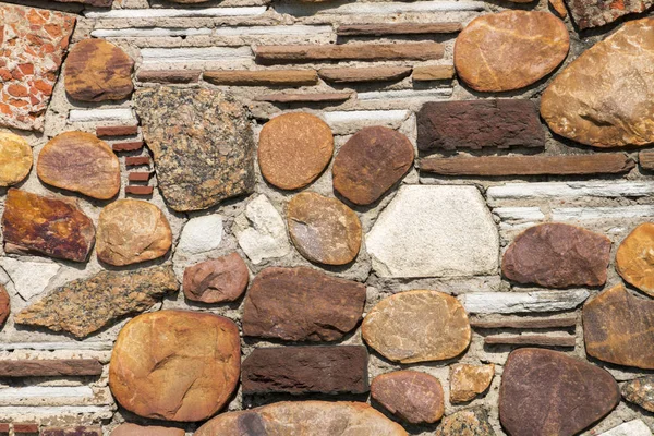 Natürliche Felsen und Steinmuster und Texturen Wandhintergrund — Stockfoto