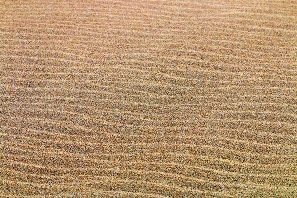 Padrões e texturas de fundo de areia de praia — Fotografia de Stock