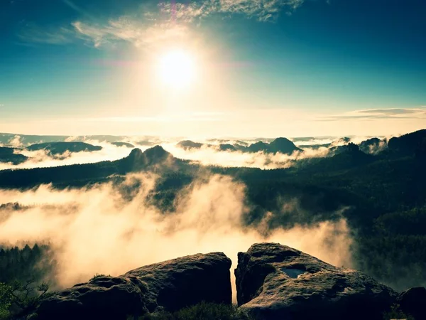 Spring colorful mist between summits. Cliff above forest — Stock Photo, Image