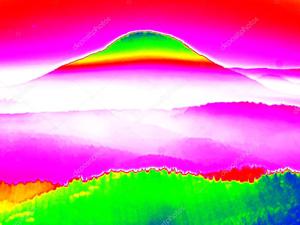Thermography photo. Hills, forest and fog in ultraviolet view