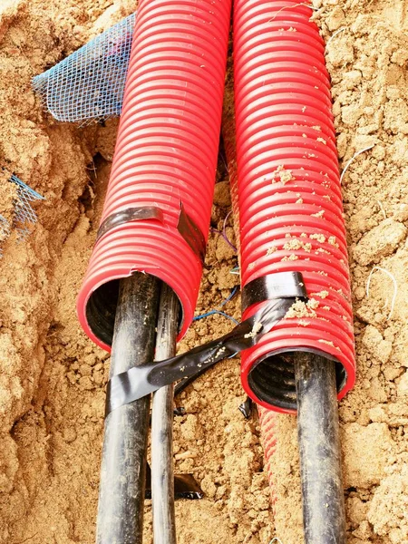 Wire in HDPE and protectivep tube. Building of lines of metallic and fiber optic cables, — Stock Image Wire in HDPE and protectivep tube. Building of lines of metallic and fiber optic cables, Stock Image