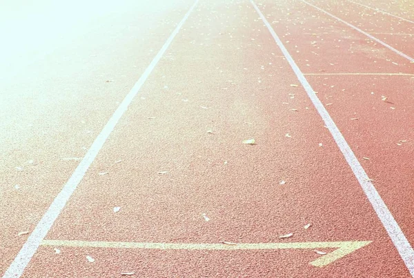 스포츠 경기장, 육상 트랙 추상화 햇살 효과 — 스톡 사진