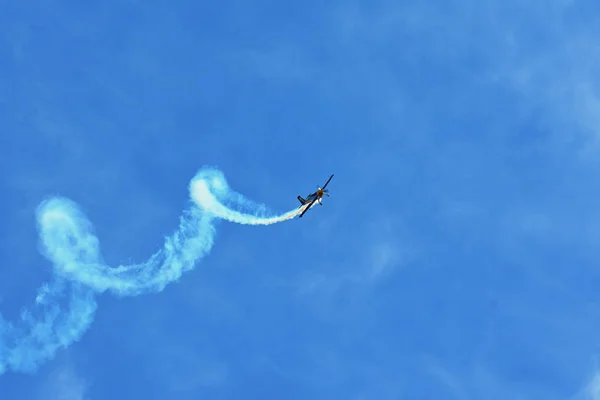 Memorial Airshow. The aerobatic team flying in Extra 330, especial  aerobatic plane Royalty Free Stock Images