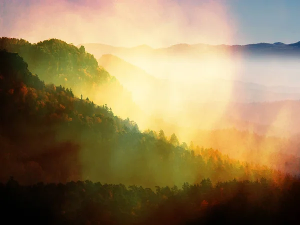 Film effect. View on a big rounded hill from plane, beautiful fantastic view. Fantastic dreamy sunrise, mountain above misty valley — Stock Photo, Image