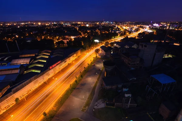27th of July, Ostrava city, Czech Republic.  Aerial view of old industrial city with Traffic on road at night. — Stock Photo, Image