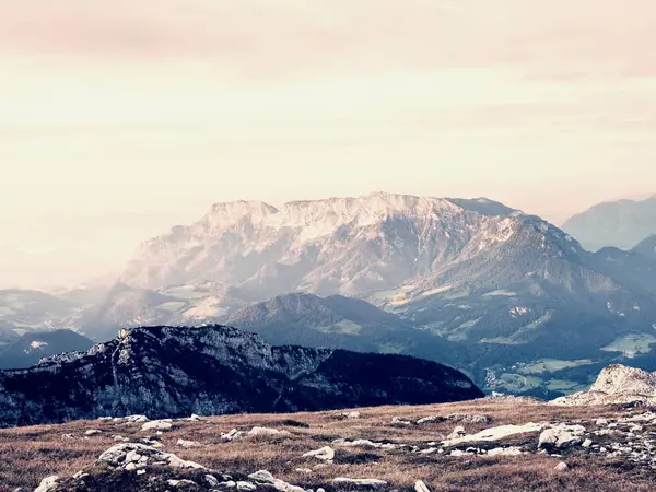 Sharp Alps peaks, rocks without people. View over Alpine rocks above deep vallyes to far horizon — Stock Photo, Image