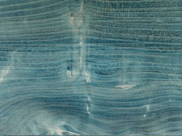 年輪の優しい質感と高齢木の板。青に係留された木製の表面 — ストック写真