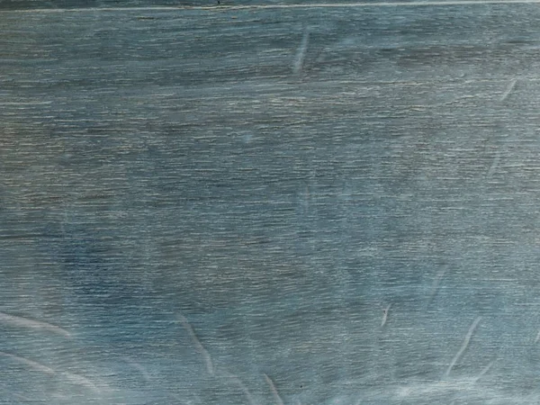 Estrutura clara de madeira de cereja com mancha azul, mesa desgastada com pátina . — Fotografia de Stock