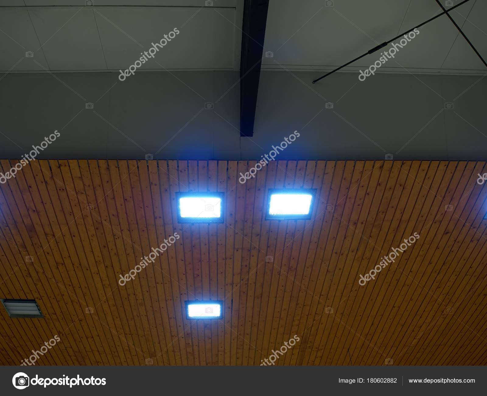 Wooden Ceiling With Lighting Panels Fluorescent Lamps On
