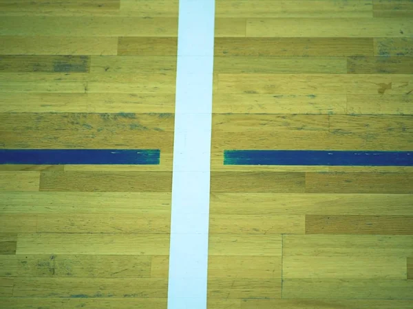 Piso de madeira pintada, madeira de parquet na quadra de basquete. O chão visto de cima — Fotografia de Stock