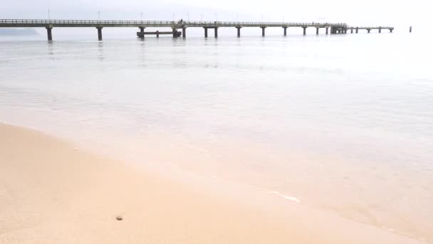 Baltic Sea Bridge Smooth Sea Sun Hidden Misty Horizon Refletion — Stock Video