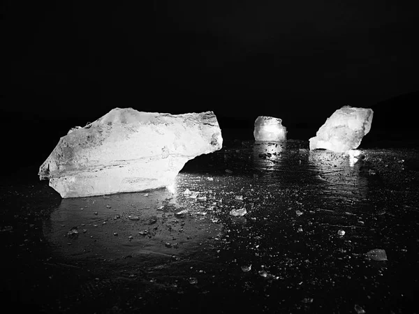 Natural ice blocks. Ice floe break due to wind against the shore and move.