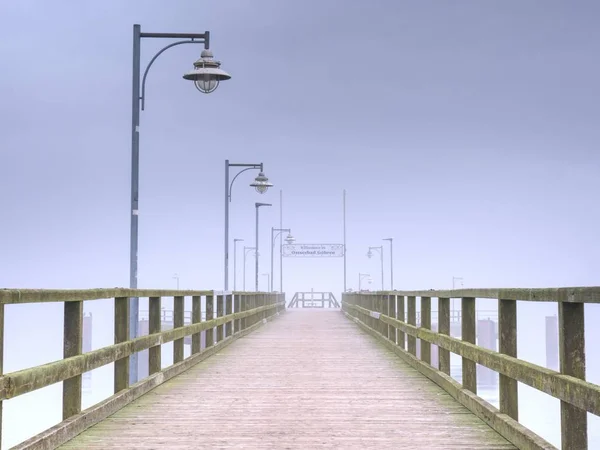 On the pier in Goehren. Close to the eastern coast of the island of Ruegen, Germany. — Stock Photo, Image