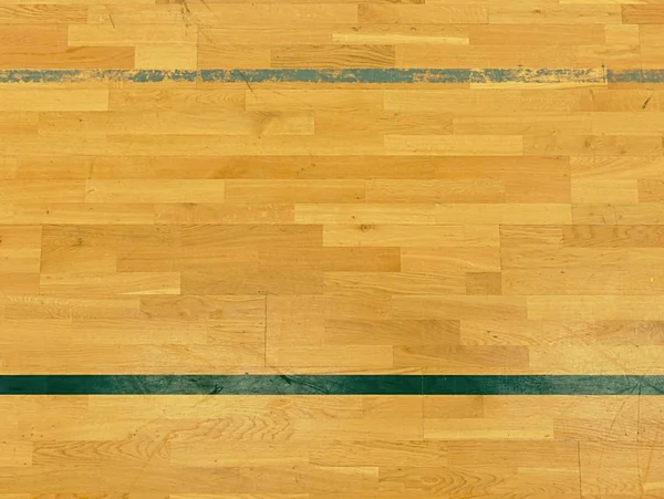 Black court corner. Worn out wooden floor of sports hall with colorful lines