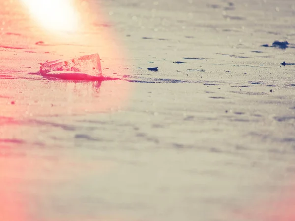 Abstract. Ice floe and crushed ice on frozen flat  ground. Shining icicle — Stock Photo, Image