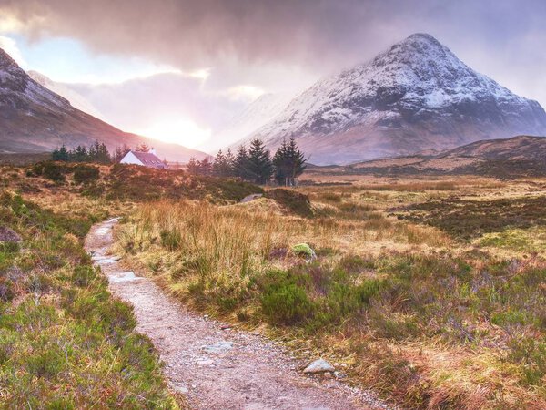 Popular trail at Coupall river, a valley in the Scottish Highlands 