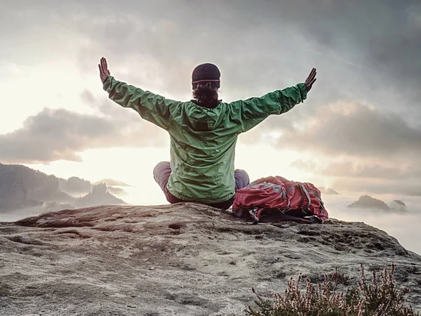 Woman just enjoying the life. Beautiful girl backpacker sit on top — Stock Photo, Image