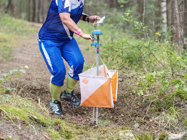 Run people  in forest checking chip with control point — 스톡 사진